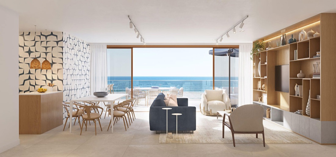 Sala de estar com varanda aberta para o mar, em perspectiva de empreendimento